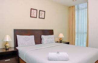 Photo 1 - Elegant And Comfort 1Br + Extra Room Apartment At Bellagio Residence