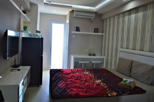 Photo 15 - Roomku at Bassura City Apartment