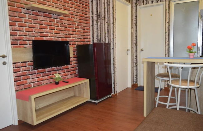 Roomku at Bassura City Apartment - Foto 24