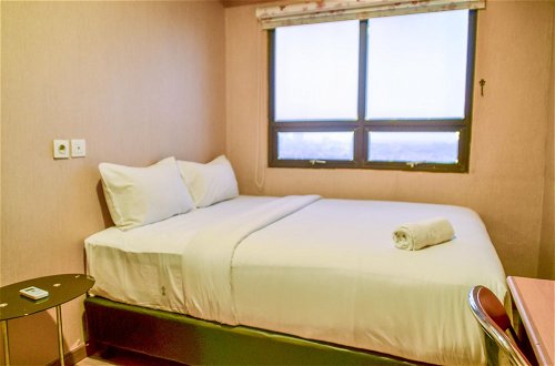 Photo 1 - Nice and Cozy 2BR Apartment at Atria Residence
