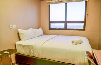 Photo 1 - Nice and Cozy 2BR Apartment at Atria Residence