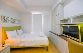 Photo 3 - Modern Style Studio Apartment at Azalea Suites with City View