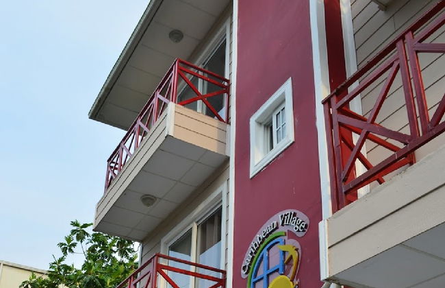 Caribbean Villages Apartments - Photo 1