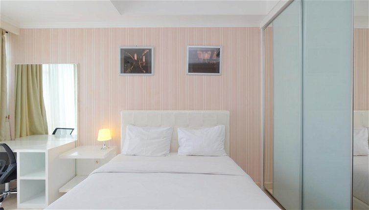 Photo 1 - Homey And Comfy Studio Room At Menteng Park Apartment