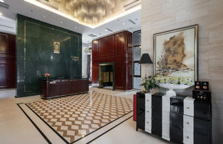 Foto 2 - Qing Apartment Mosaic Mansion