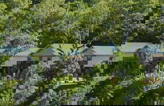 Foto 1 - Anglers Riverfront Cabins