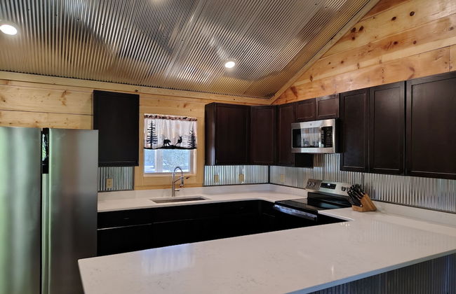 Anglers Riverfront Cabins - Photo 13