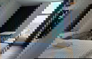 Photo 2 - Cosmy Benson 38 Apartment
