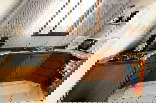 Photo 10 - Casa Ampla 1 suite 2quartos churras e AC