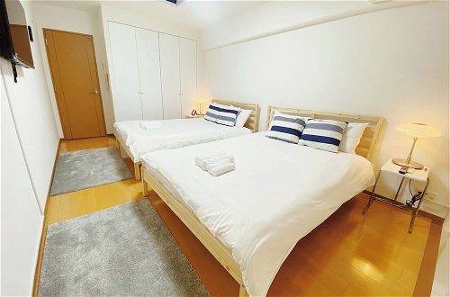Foto 11 - I Cube Kozu Apartment