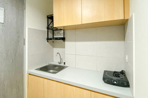 Photo 11 - Nice And Comfort 2Br At Osaka Riverview Pik 2 Apartment