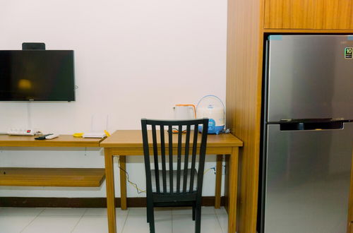 Photo 11 - Warm And Minimalist 1Br Apartment At Scientia Residence