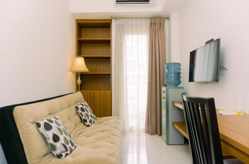 Photo 10 - Warm And Minimalist 1Br Apartment At Scientia Residence