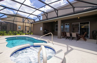 Photo 2 - Gorgeous 5 Bd w Pool Jacuzzi Close to Disney 6071