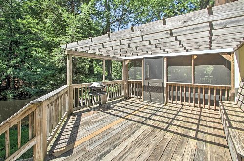 Photo 11 - Luxe Riverfront Cottage w/ Dock by Lake Horace