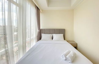 Photo 3 - Nice And Minimalist 2Br At Menteng Park Apartment