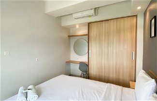 Photo 2 - Minimalist And Cozy 1Br Apartment At Mustika Golf Residence