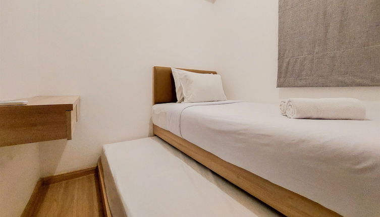 Photo 1 - Warm And Comfort Stay 2Br At Sky House Bsd Apartment