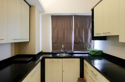 Photo 9 - Homey 3Br Apartment At Braga City Walk