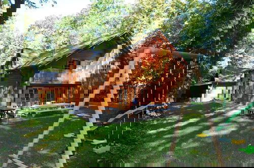 Photo 1 - Spacious Chalet Located at Bomal with Hot Tub & Garden Parlour