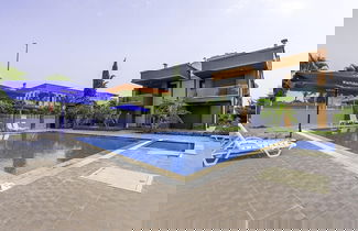Photo 1 - Flat w Shared Pool and Balcony 8 min to Beach