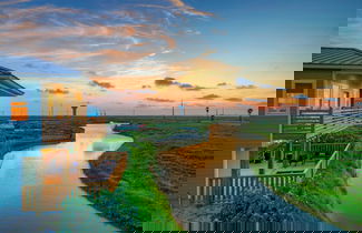 Photo 3 - Boardwalk to the Beach, Water Canal View, Priv Pool Island Girl by Avantstay