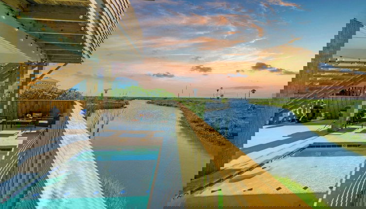 Photo 1 - Boardwalk to the Beach, Water Canal View, Priv Pool Island Girl by Avantstay