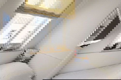 Foto 5 - 8 