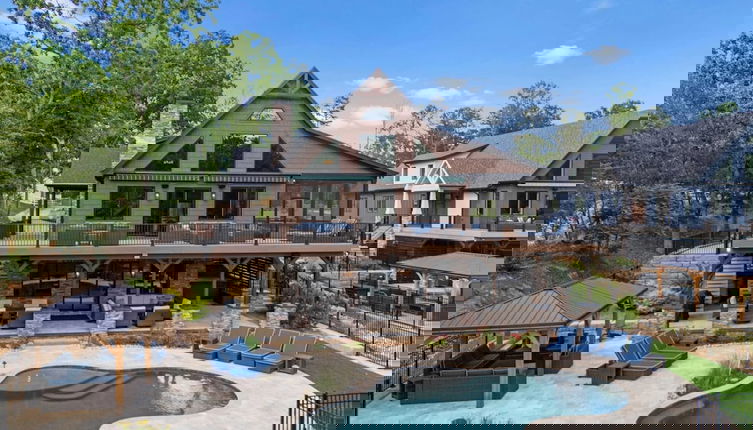 Photo 1 - Black Bear Lodge by Avantstay Lakefront, Dock, Pool, Theater Sleeps 20+