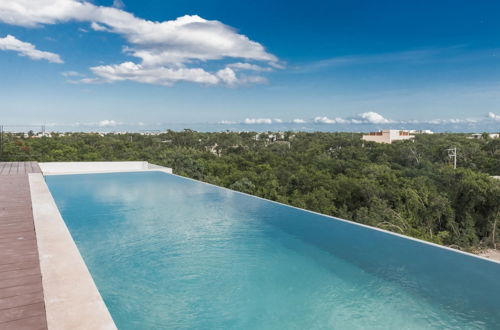 Photo 32 - Trendy Tulum Escape Condo Breathtaking View From Rooftop Terrace Infinity Pool Great Decor