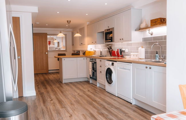 Riverbank Cottage - Foto 1