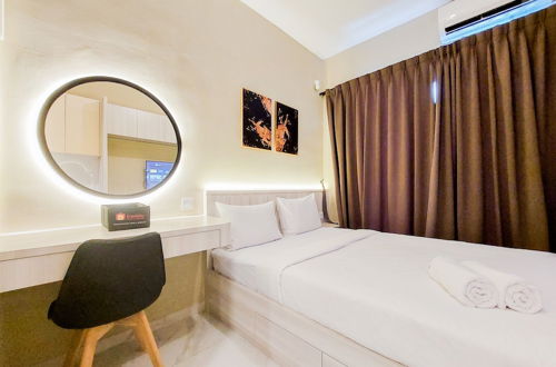 Photo 1 - Relaxing And Homey Studio Room Sky House Bsd Apartment