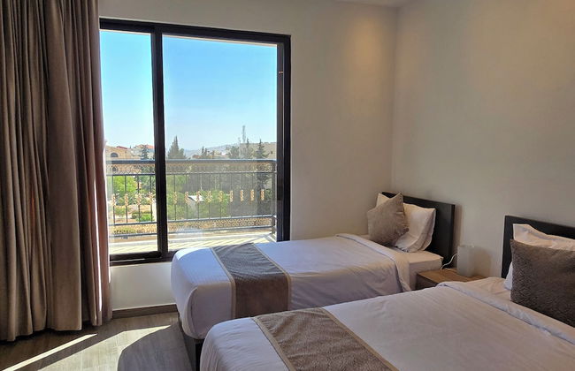 ALSHAKREEN SUITES - Photo 6
