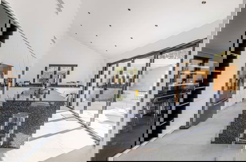Photo 11 - Modern Villa With Heated Pool and Garden