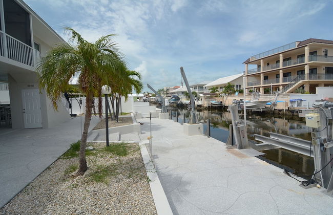 Beautiful Canal Front Home With Above Ground Pool, Dock And Fish Cleaning Station 4 Bedroom Home by RedAwning - Foto 23