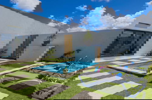 Photo 7 - Brand NEW 3BR w Private Pool Walk to Palm Beach