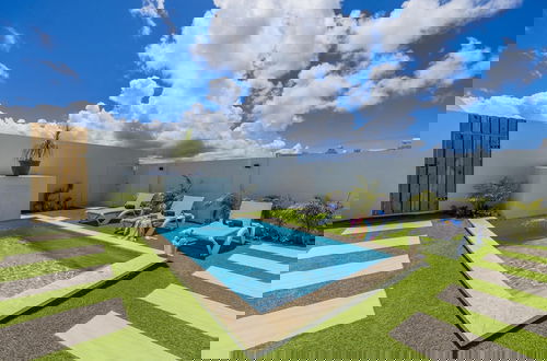 Photo 29 - Brand NEW 3BR w Private Pool Walk to Palm Beach