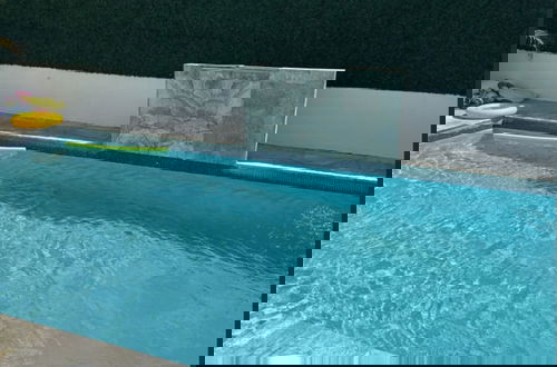 Foto 2 - Otium Vacation Rental With Pool Steps From The Beach Parking Pet Friendly