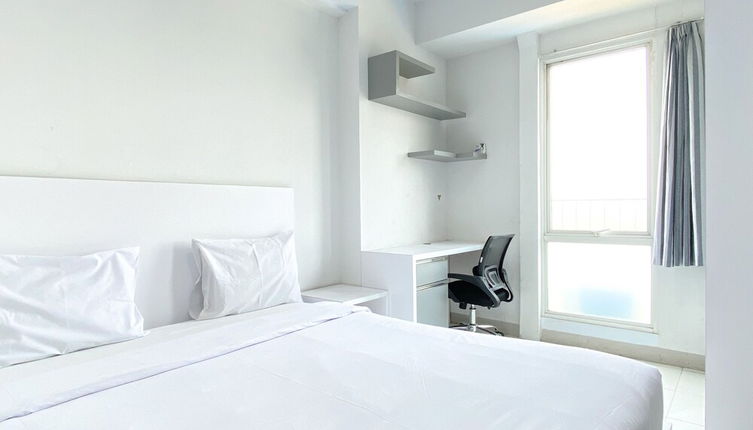 Photo 1 - Minimalist And Nice Studio At Azalea Suites Apartment