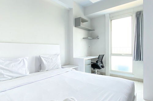 Photo 1 - Minimalist And Nice Studio At Azalea Suites Apartment