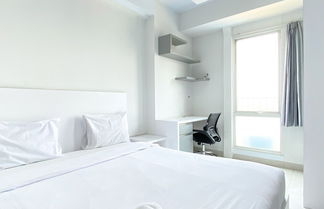 Photo 1 - Minimalist And Nice Studio At Azalea Suites Apartment