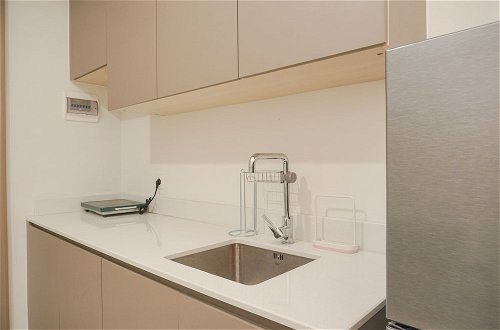 Foto 4 - Stunning And Homey 1Br Gold Coast Apartment Pik