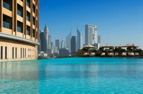 Photo 25 - SuperHost - Glamorous Apt with Terrace Overlooking Skyline I Address Dubai Mall