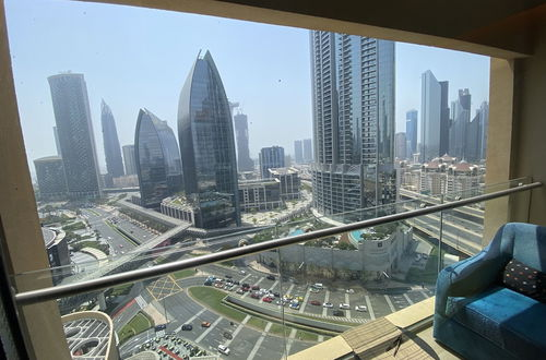 Photo 38 - SuperHost - Glamorous Apt with Terrace Overlooking Skyline I Address Dubai Mall