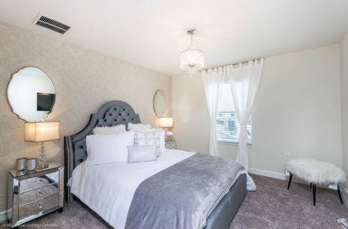 Photo 6 - Gorgeous Townhome In Champion's Gate Near Disney! 4 Bedroom Townhouse by RedAwning