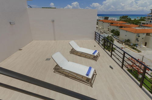 Photo 40 - Entire Modern Apartment 2 min Walk to the Beach Private Rooftop Pool