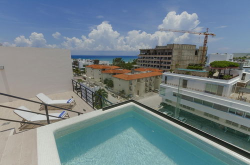 Photo 24 - Entire Modern Apartment 2 min Walk to the Beach Private Rooftop Pool