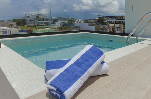 Photo 22 - Entire Modern Apartment 2 min Walk to the Beach Private Rooftop Pool