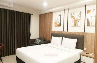 Photo 2 - Comfort And Simply Look Studio Room At Mataram City Apartment