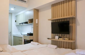 Photo 2 - Cozy Living Studio Apartment At High Floor Tokyo Riverside Pik 2